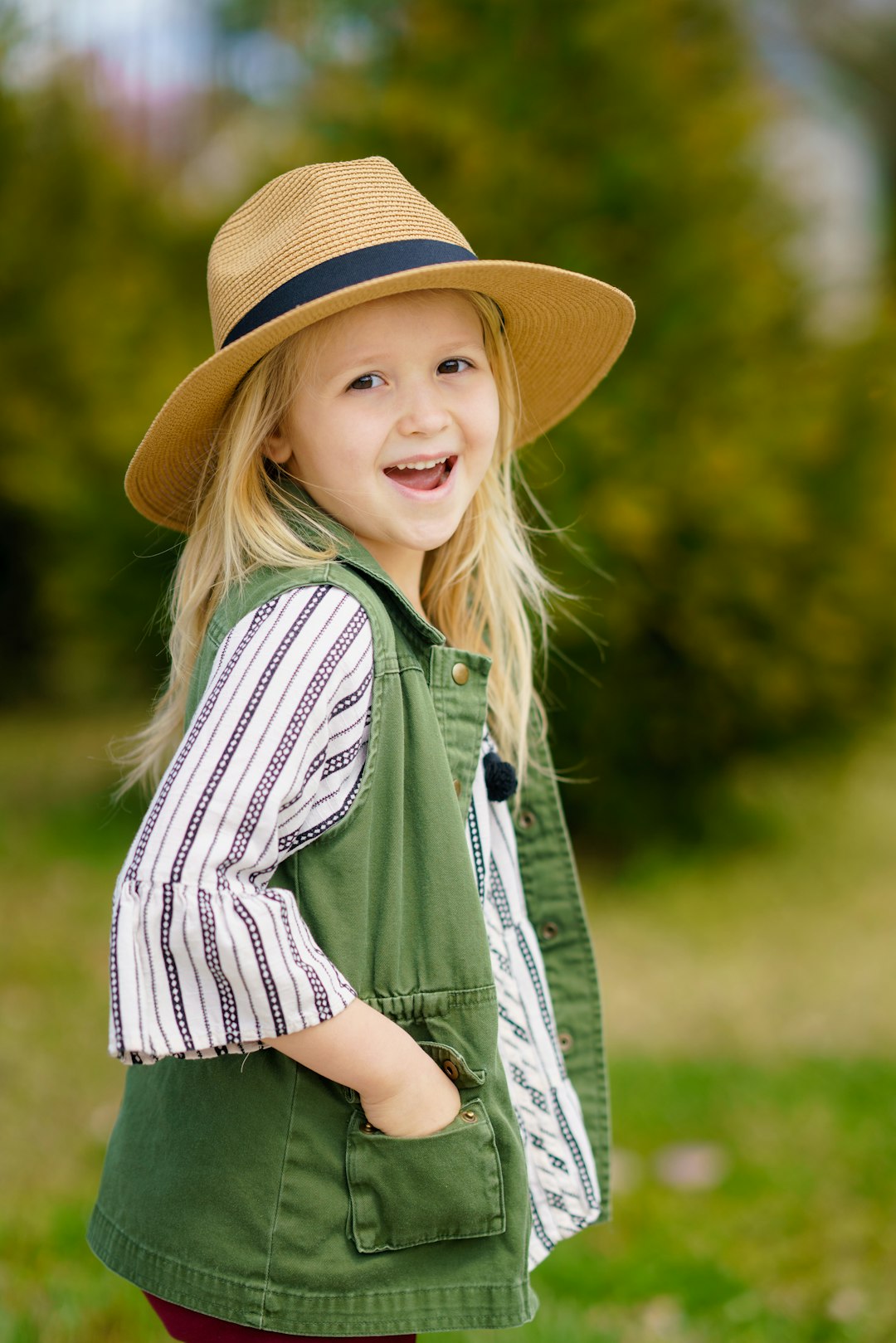selective-focus-photography-of-girl-smiling-wearing-sun-hat-11gzvrmzfuu